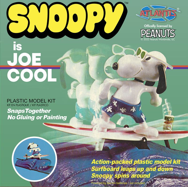 Snoopy as Joe Cool in a retro motorized surf model kit, featuring easy snap assembly and exciting action moves.