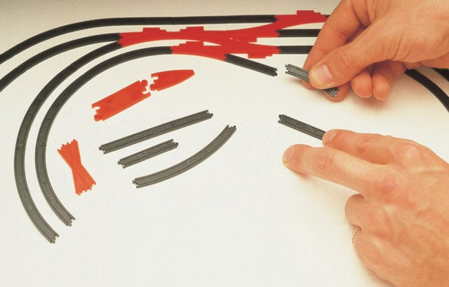 Hornby Track Planning Symbols pack with over 100 quarter-scale track replicas for designing model train layouts.