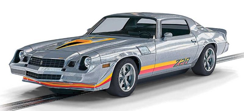 1/32 scale Scalextric Camaro Z28 in striking silver, showcasing muscle car design and performance for racing and display.