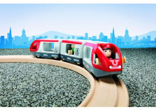 Wooden BRIO Travel Train set featuring a vibrant red train with three wagons, a passenger car, and a driver for imaginative play.