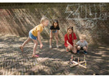 Colorful wooden ring toss game, perfect for outdoor fun and enhancing motor skills for all ages.