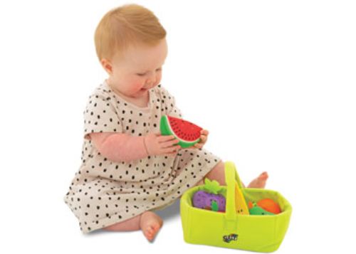 Colorful soft fruit basket with assorted textured fruit toys, promoting imaginative play and fine motor skills for toddlers.