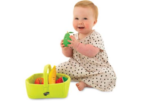 Colorful soft fruit basket with textured toys, including a rattling apple and crinkly banana, for imaginative toddler play.