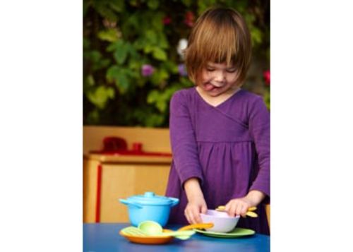 Eco-friendly Green Toys Chef Set featuring a pot, skillet, ladle, and spatula for imaginative culinary play.