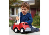 Eco-friendly Green Toys Fire Truck made from recycled plastic, featuring a rotating ladder and removable side ladders for imaginative play.