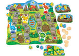 Colorful Dino-Snore-Us game by Orchard Toys, featuring dinosaur eggs and a sleeping T-rex; ideal for fun learning and family play.