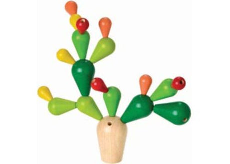 Colorful PlanToys Balancing Cactus game for 1-4 players, promoting fine motor skills and teamwork while ensuring safety and fun.