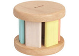 Colorful wooden roller toy in pastel shades, designed for sensory play and motor skill development in toddlers.