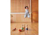 Colorful PlanToys Bowling Set for kids, crafted from eco-friendly materials, promoting motor skills and imaginative play.