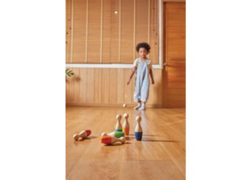 Colorful eco-friendly bowling set for kids, enhancing motor skills and encouraging outdoor play and social interaction.