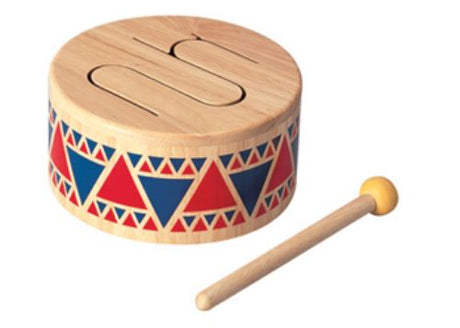 Colorful PlanToys Solid Drum for toddlers, promotes creativity and rhythm with varying tones and eco-friendly materials.