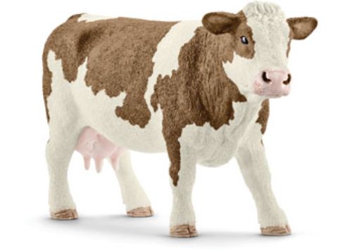 Schleich Simmental cow figure with distinctive white head and legs, featuring a patchy gold to reddish-brown coat. Suitable for ages 3+.