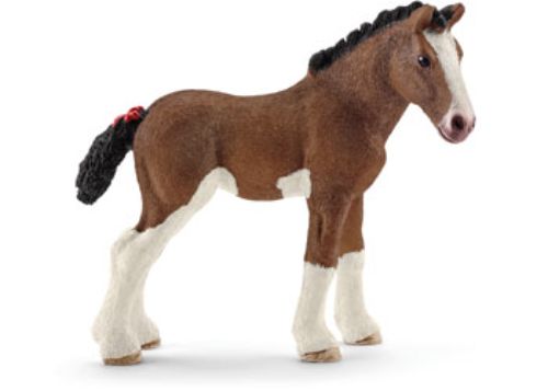 Schleich Clydesdale foal figure, detailed and lifelike, perfect for imaginative play and learning about horses.