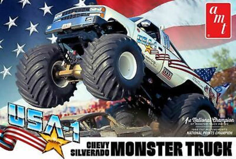 Detailed AMT 1/25 USA1 Monster Truck model kit featuring supercharged engine, opening hood, and gigantic tires.