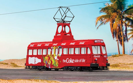 Corgi 1/76 diecast Coca-Cola tram model showcasing 'Coke Side of Life' branding, perfect for collectors and nostalgic displays.