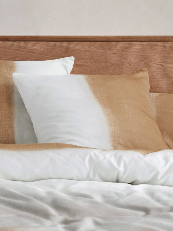 King Duvet Cover Set in sand, featuring luxurious cotton sateen with a terracotta to creamy white gradient for stylish comfort.