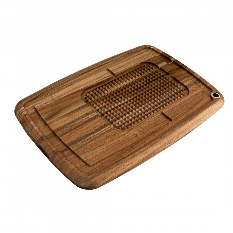 Peer Sorensen carving board with feet, 56x39x6cm, crafted from acacia wood, featuring juice grooves and non-slip pads.