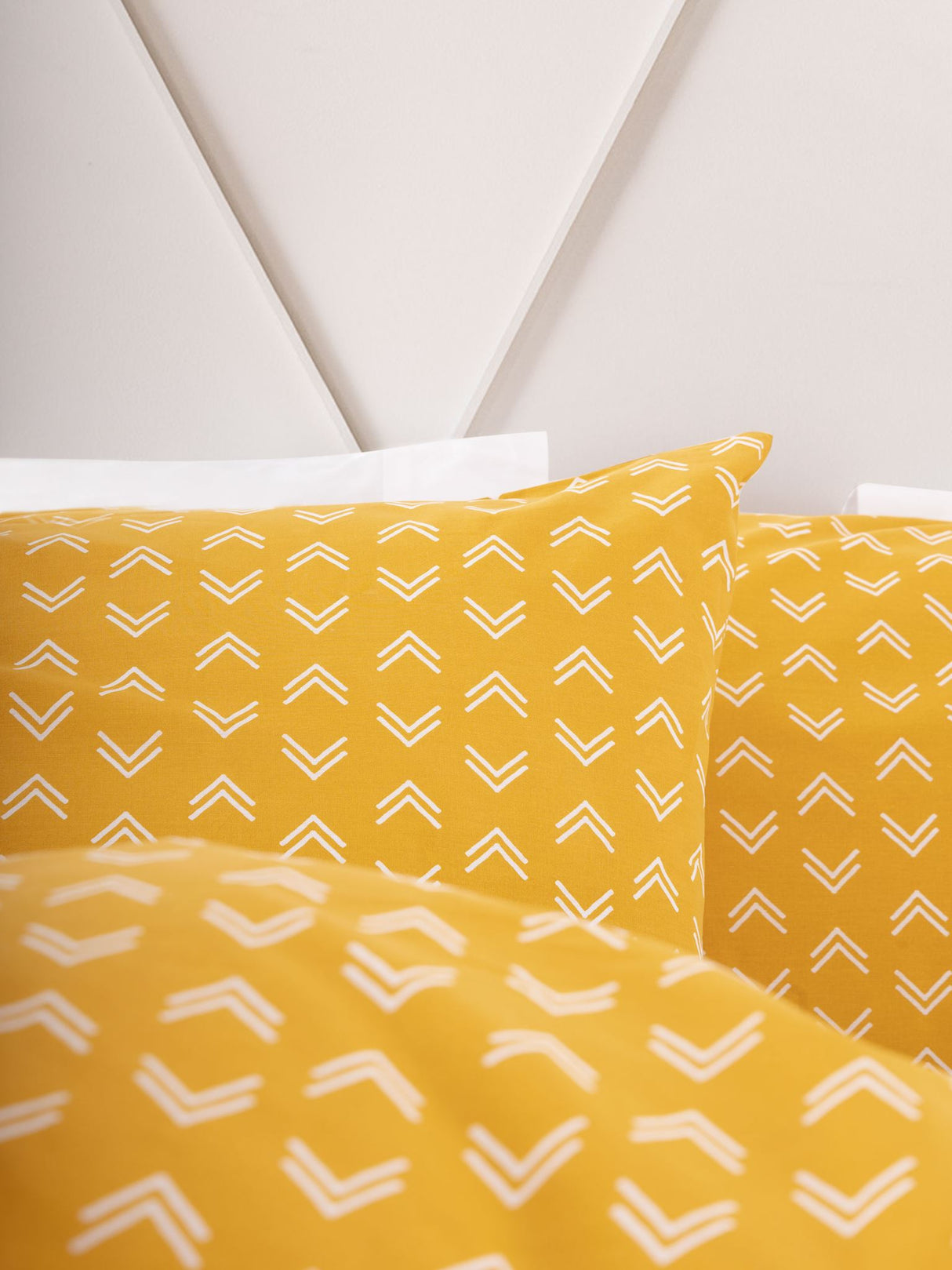 Double duvet cover set in mustard with chic hand-drawn pattern, crafted from 100% cotton for comfort and style.