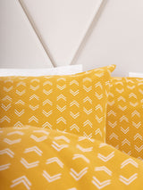 Double duvet cover set in mustard with chic hand-drawn pattern, crafted from 100% cotton for comfort and style.