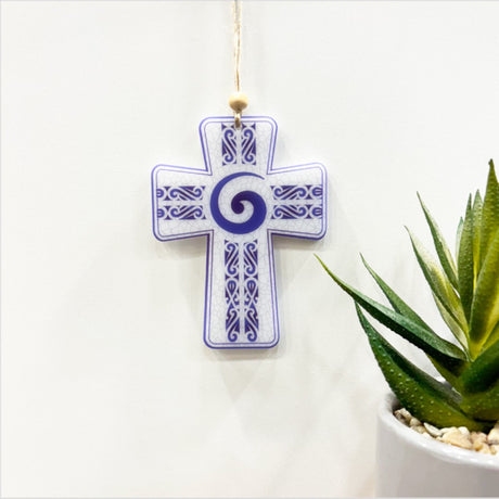 Hanging ornament featuring Koru design, 6mm thick satin acrylic, 89mm x 118mm, perfect for home decor or gifts.