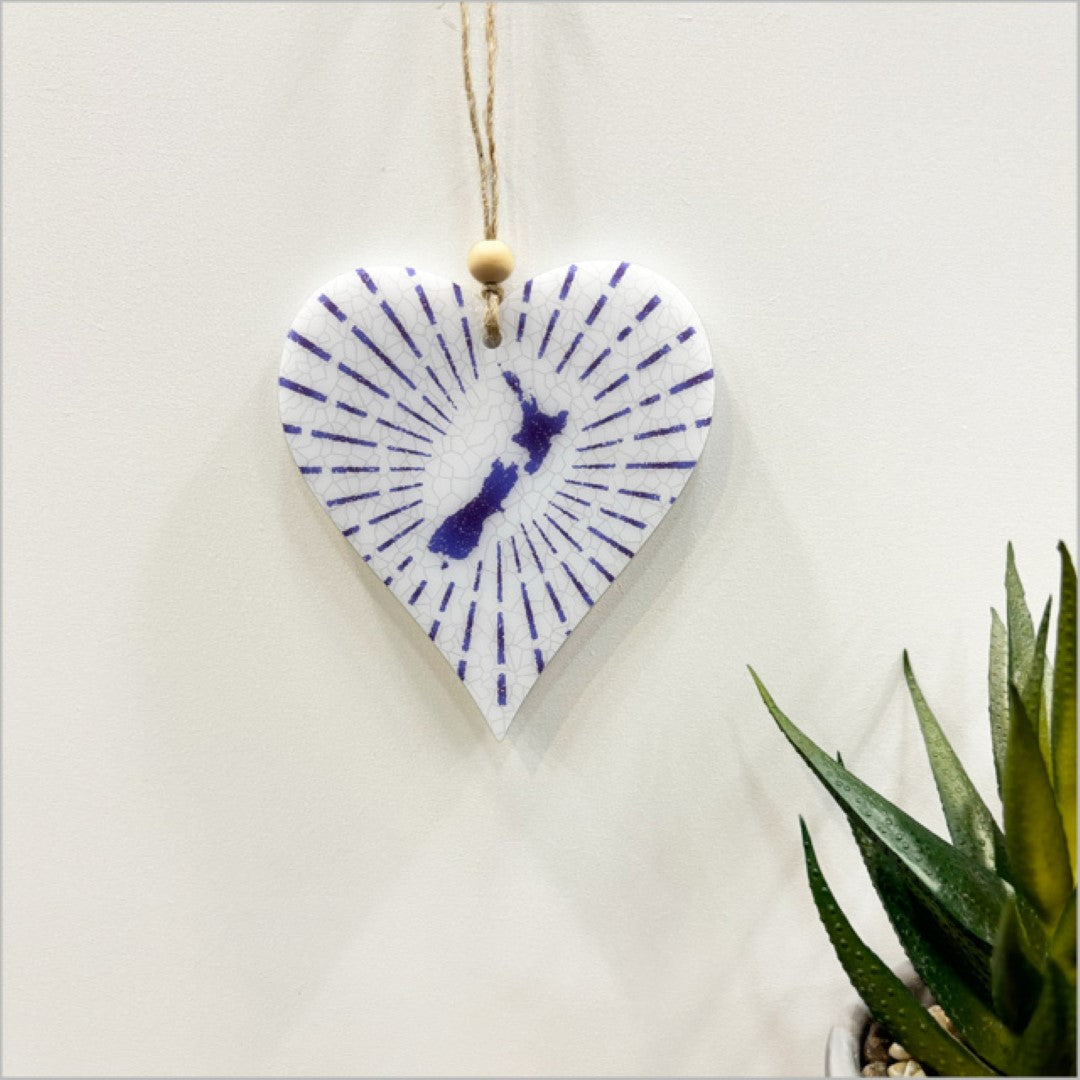 Vibrant heart-shaped hanging ornament in satin acrylic, ideal for festive decor or heartfelt gifts.