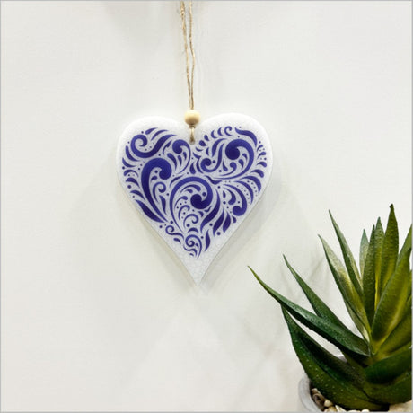 Elegant hanging ornament with intricate heart filigree design, crafted from 6mm satin acrylic, perfect for home decor or gifts.