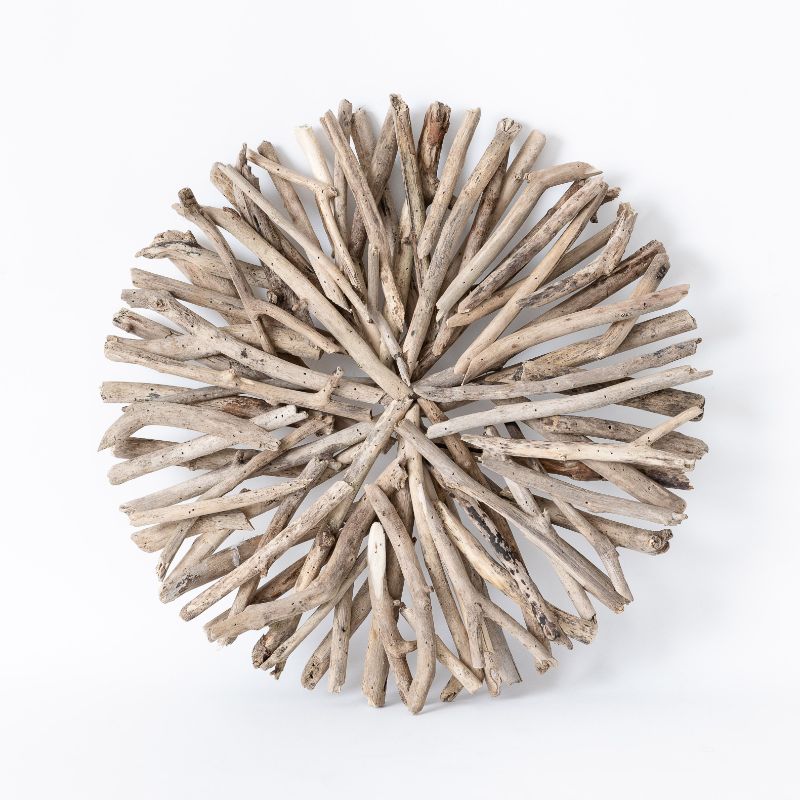 Elegant 60cm driftwood hanging circle, handcrafted from reclaimed wood, adding coastal charm to any decor.