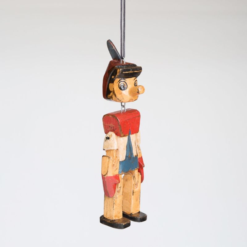 Set of 6 whimsical 15cm mini Pinocchio wood hanging ornaments, perfect for festive decor.