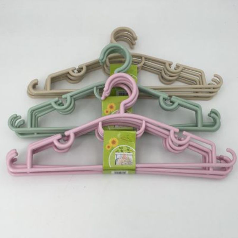 Set of 60 durable, non-slip clothes hangers for organized, wrinkle-free garment storage.