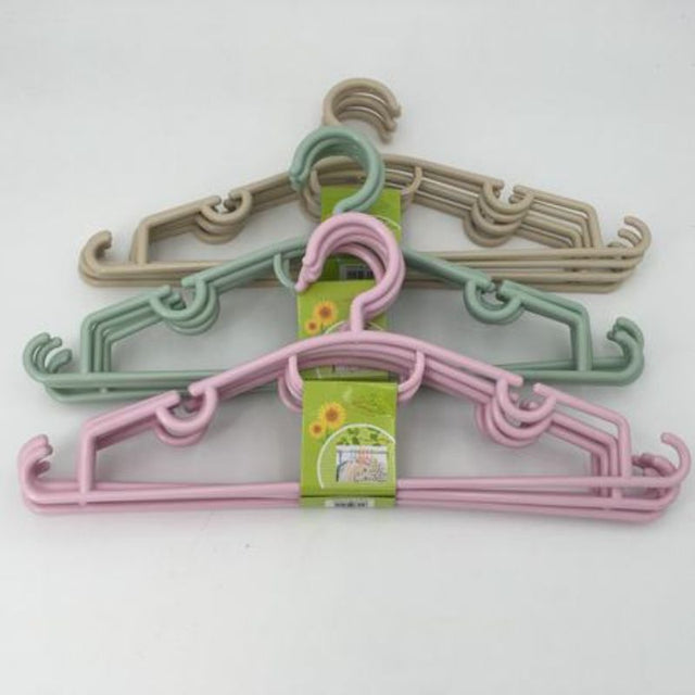 Set of 60 durable, non-slip clothes hangers for organized, wrinkle-free garment storage.