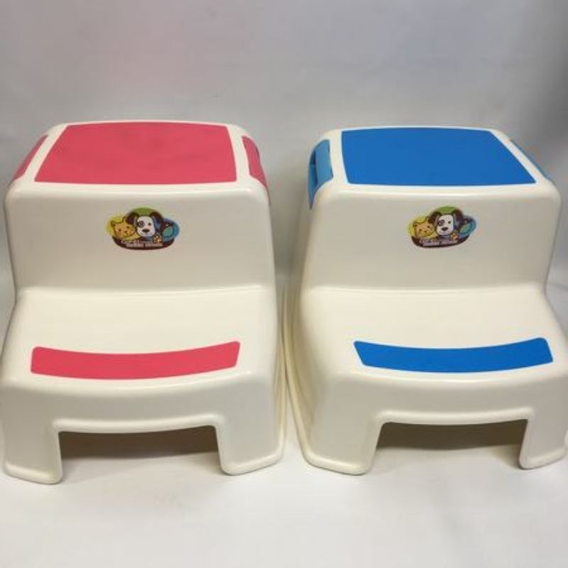 Set of 6 assorted 2-step stools in various colors, ideal for reaching high places with safety and stability.