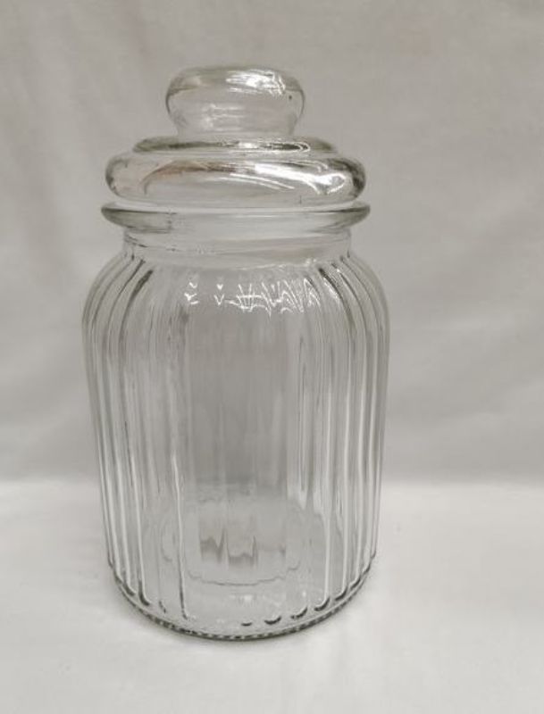 Set of 12 durable 950ML glass jars, perfect for organizing and preserving food while enhancing kitchen decor.