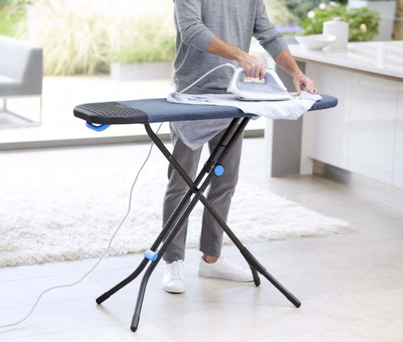 Joseph Joseph Glide Plus Ironing Board in Black/Blue, featuring compact design, adjustable height, and mess-free ironing technology.