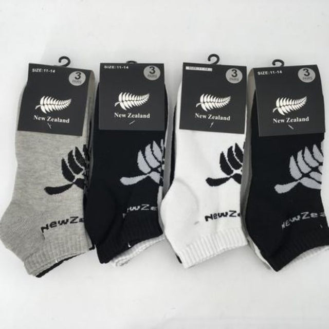New Zealand assorted socks in sizes 11-14, featuring vibrant designs in a 3-pack for comfort and style.