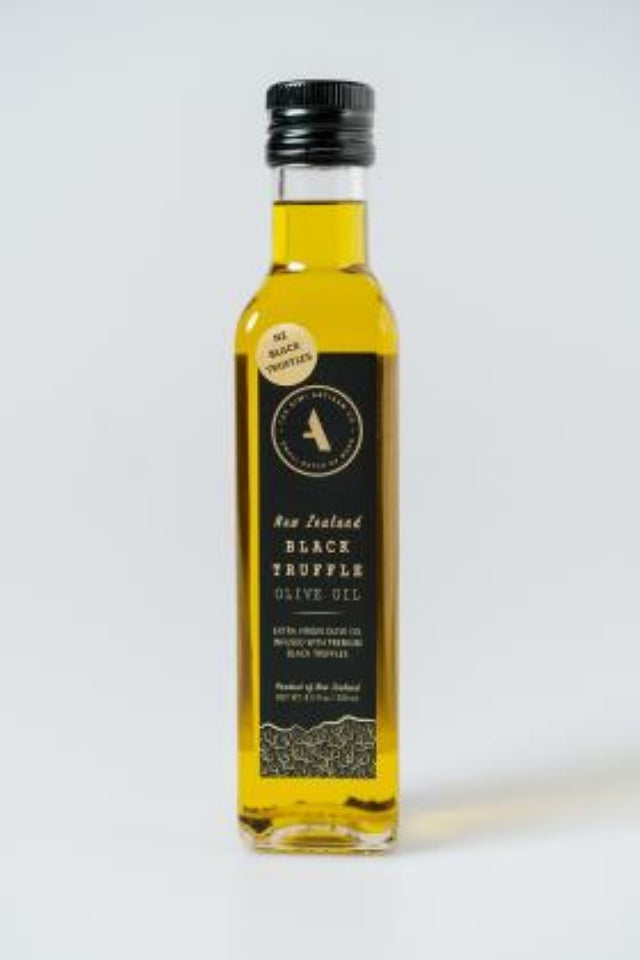 250ML bottle of Oil Truffle Black, featuring rich cold-pressed olive oil infused with premium black truffles from New Zealand.