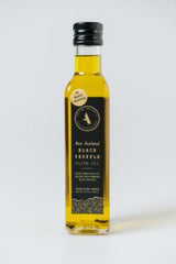 Bottle of Oil Truffle Black (250ML) featuring cold-pressed olive oil infused with premium black truffles from New Zealand.