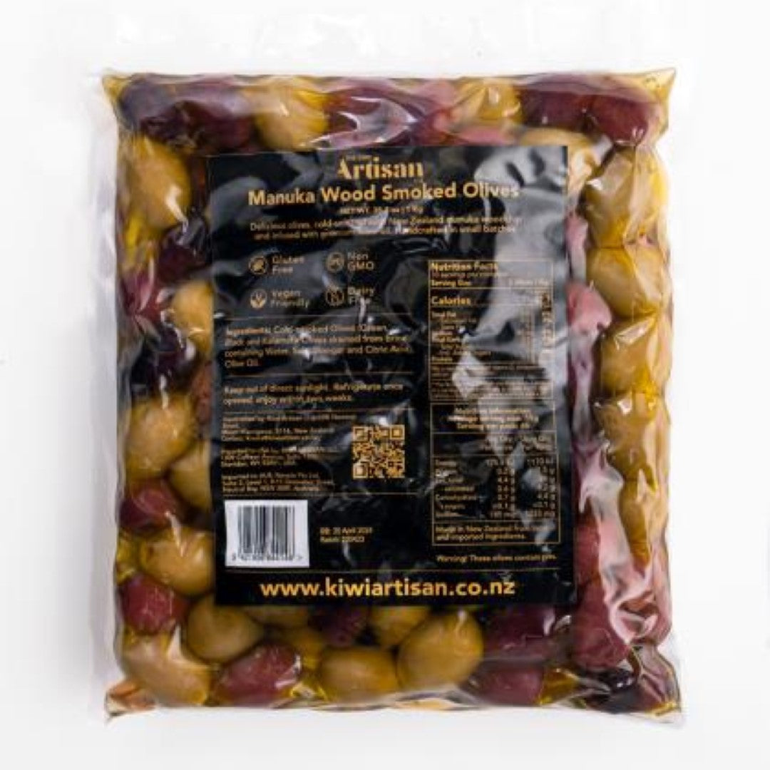 A 1kg package of Olives Manuka Smoked featuring premium olives cold-smoked with New Zealand Manuka wood and infused with olive oil.