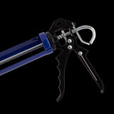 Heavy-duty mastic gun with a steel frame, ergonomic grips, and double-spring mechanism for precise sealant application.