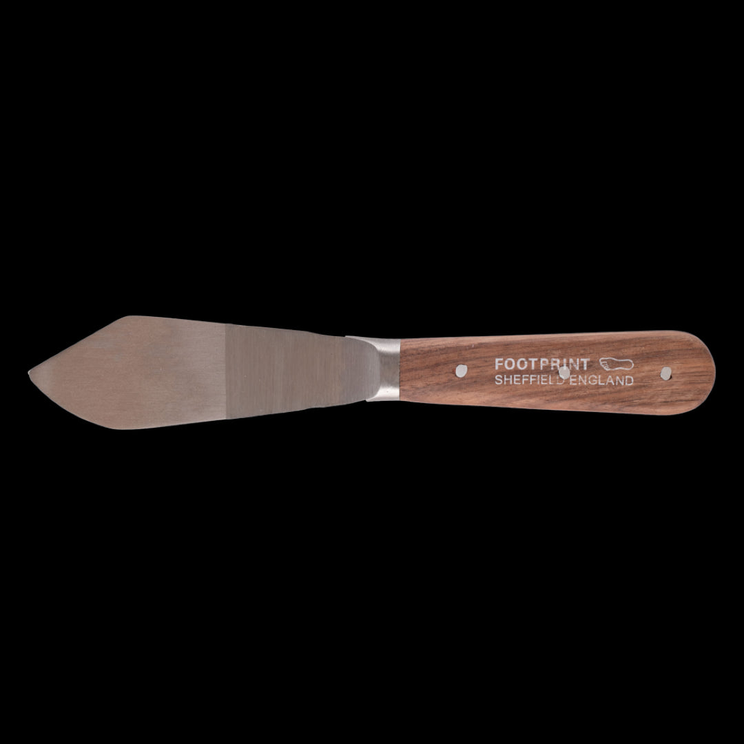 FOOTPRINT Putty Knife with clipt point blade for precise putty application, crafted from durable spring tempered steel.