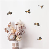 Wall art featuring laser-cut fantail designs from textured board, perfect for nature-inspired home decor.