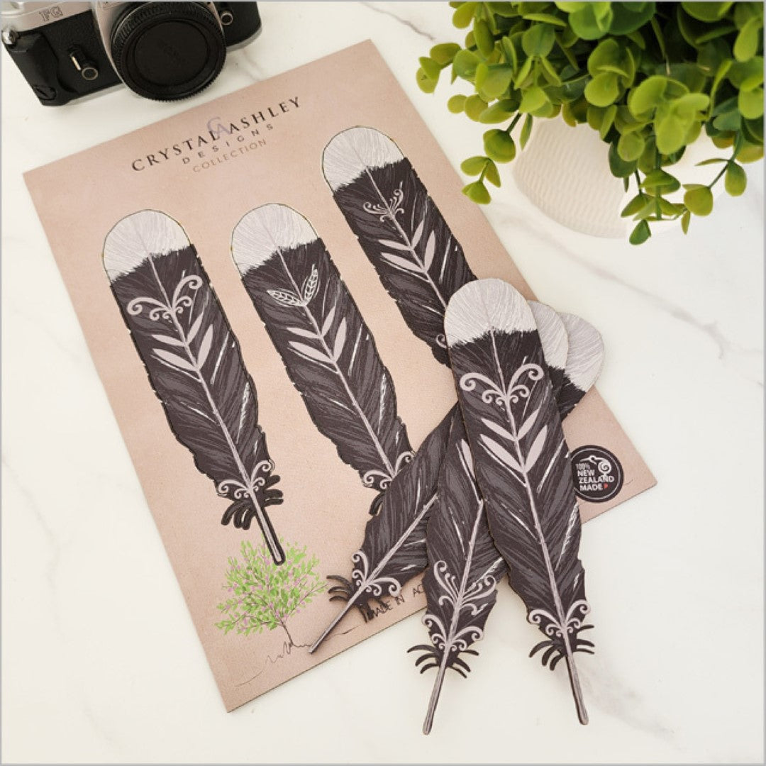 Pop Out Huia Feather Set wall art featuring textured feathers, perfect for custom decor and celebrating New Zealand's heritage.