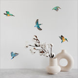 Colorful wall art featuring pop-out kingfishers, handcrafted in New Zealand on textured board, ideal for home decor.