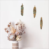 Elegant copper patina feathers wall art set, lightweight and customizable for stylish home decor.