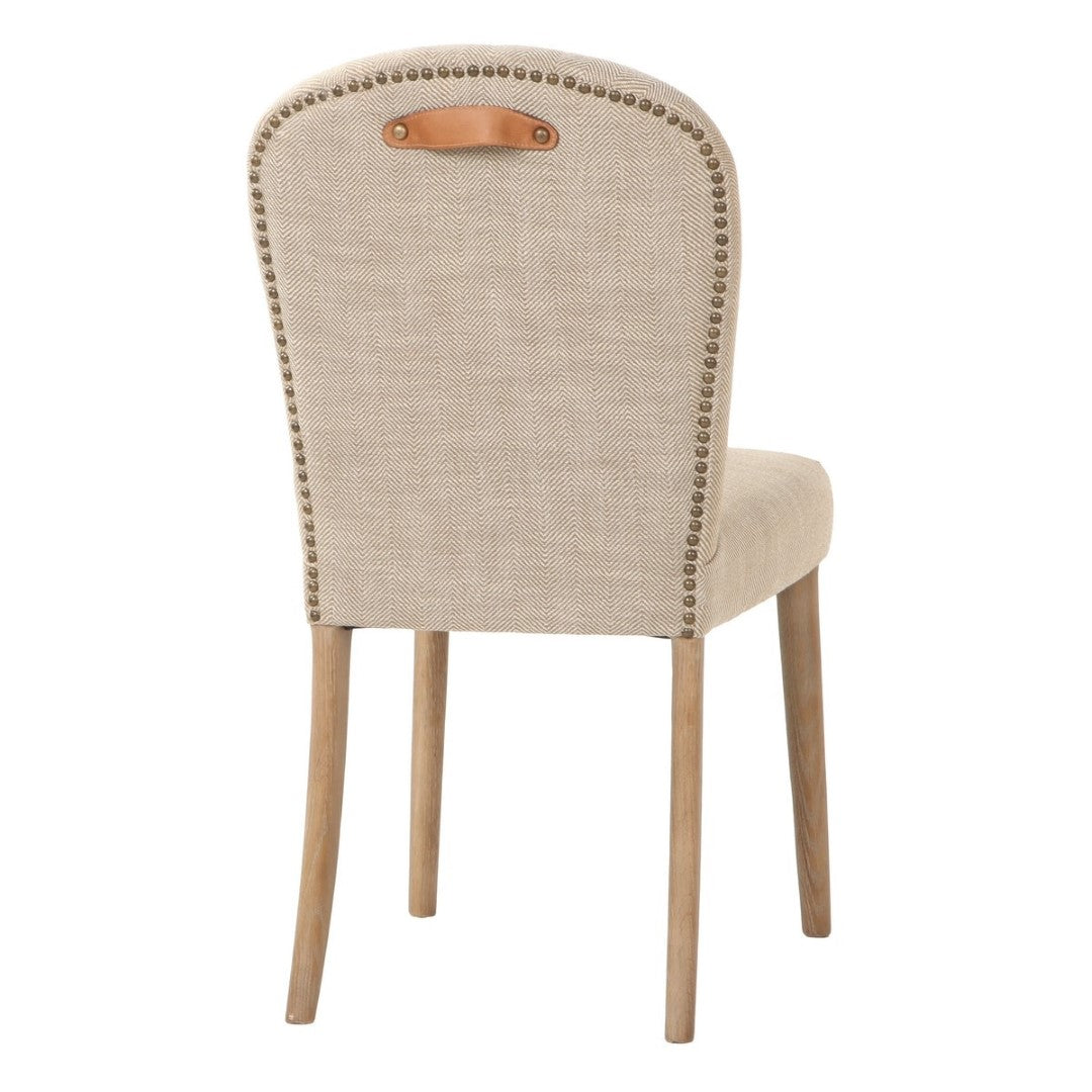 Amberley Fabric Dining Chair featuring leather handle, studded edges, and a cozy poly/cotton seat in natural ash wood frame.