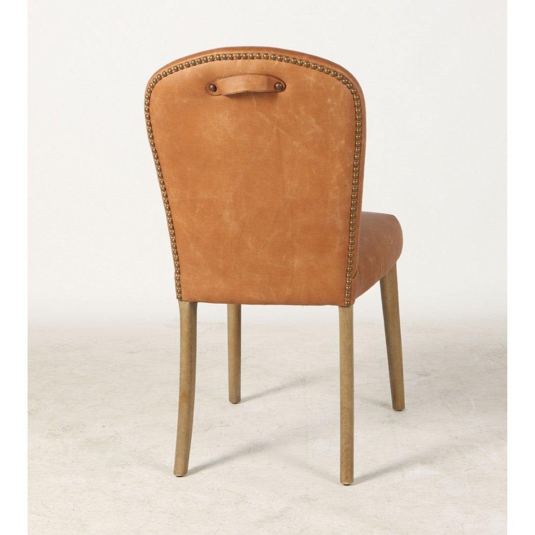 Amberley Tan Top Grain Leather Dining Chair with handle, studs, and sturdy ash wood legs, offering elegance and comfort.