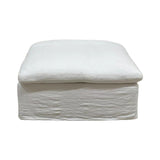 Plush cloud-colored Carlton Ottoman, perfect for seating or a footrest, enhancing any living space with style and comfort.