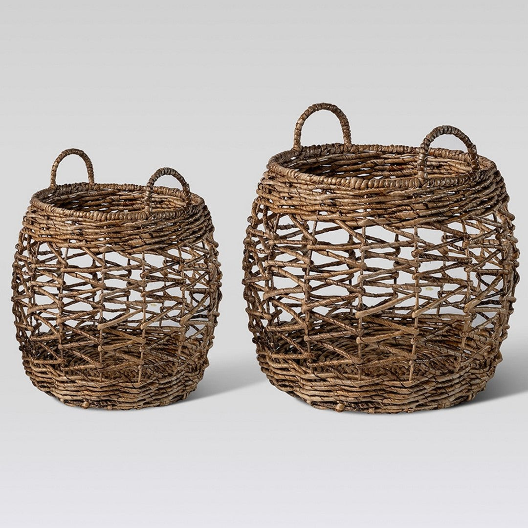 Set of 2 handcrafted natural seagrass baskets with rustic woven design for versatile storage of blankets and toys.