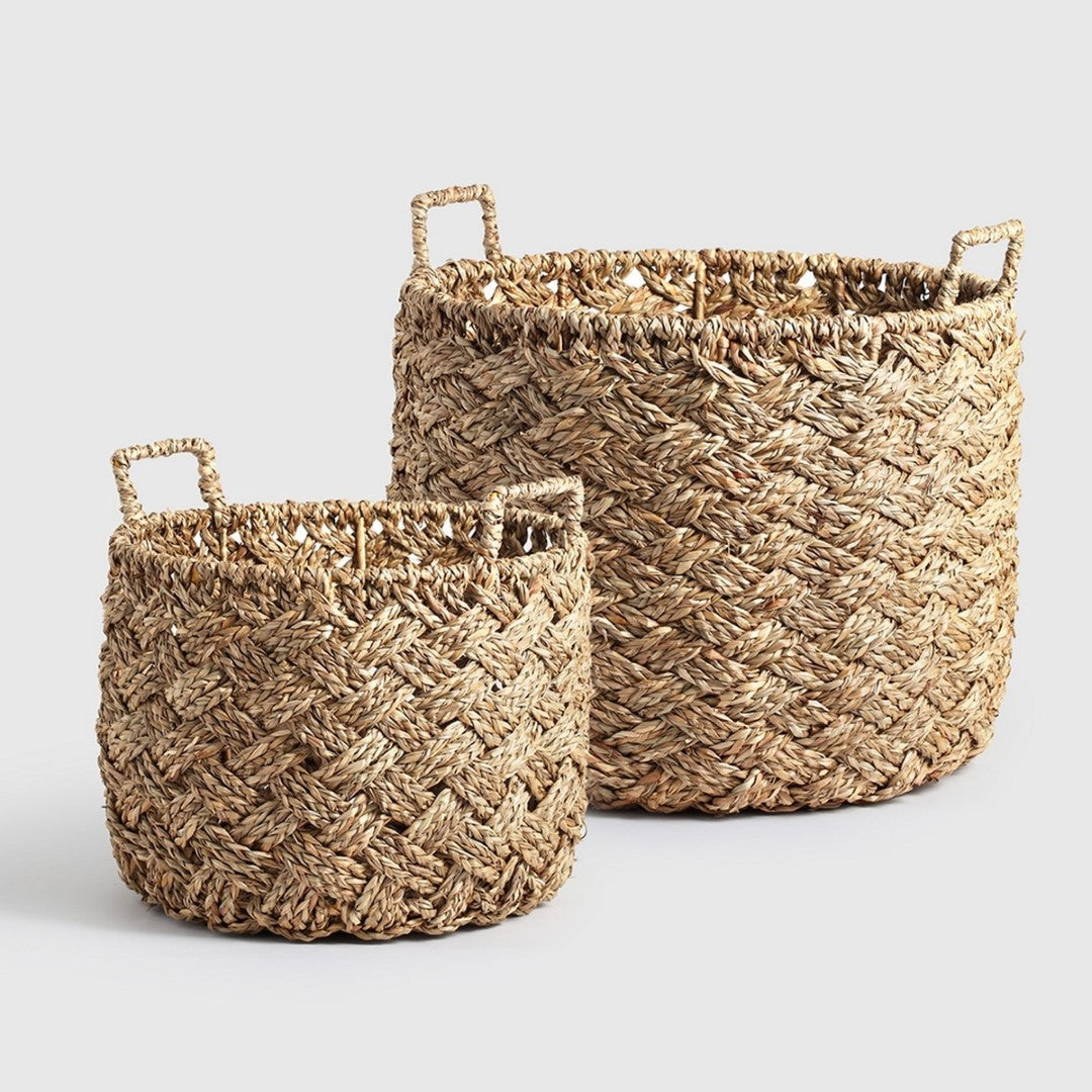 Handcrafted natural seagrass baskets set of 2, featuring rustic woven design, perfect for stylish home storage and organization.