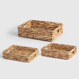 Set of 3 natural water hyacinth trays with woven design, perfect for organizing, serving, and enhancing home decor.