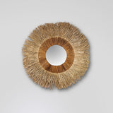 Handcrafted seagrass mirror (1.3m) with unique weave, adding earthy charm to any room while enhancing light and space.